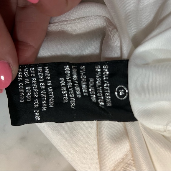 White one shoulder dress with a symmetrical, hemline and ruffle - Picture 7 of 7